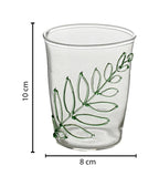 Glass with green leaf drawing
