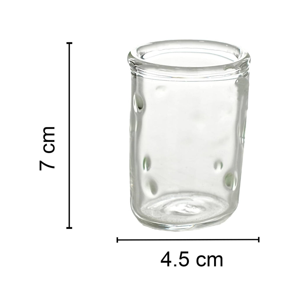 Glass for spoon, with dots